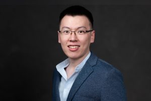 Headshot of Yixuan Wu in formal dress.