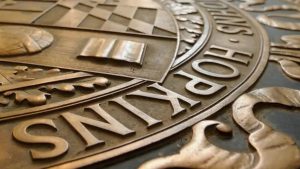 The Johns Hopkins seal on the floor of Gilman Hall.